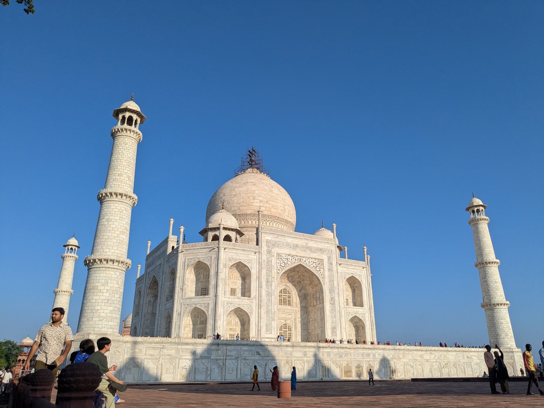 The Taj Mahal photographed against a deep blue morning sky