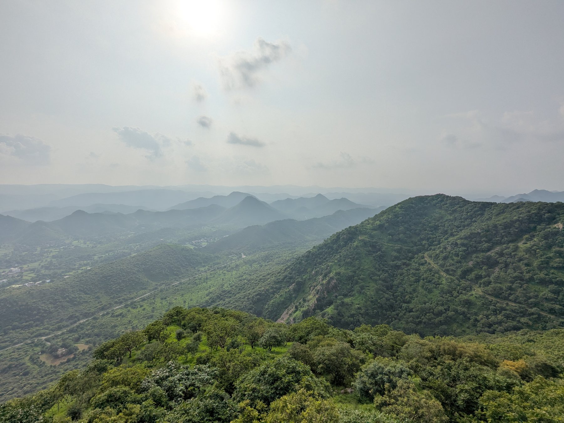 Green Aravalli hills viewed from the road to Monsoon Palace